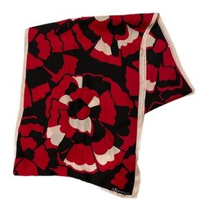 Anne Klein silk scarf in red and black floral. Oblong shape 14 by 60 inches.
